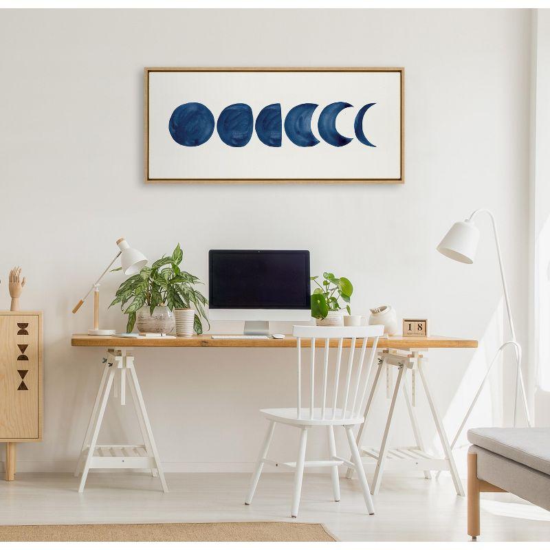 Kate and Laurel Sylvie Linear Moon Phases Framed Canvas by Teju Reval of SnazzyHues, 18x40, Natural