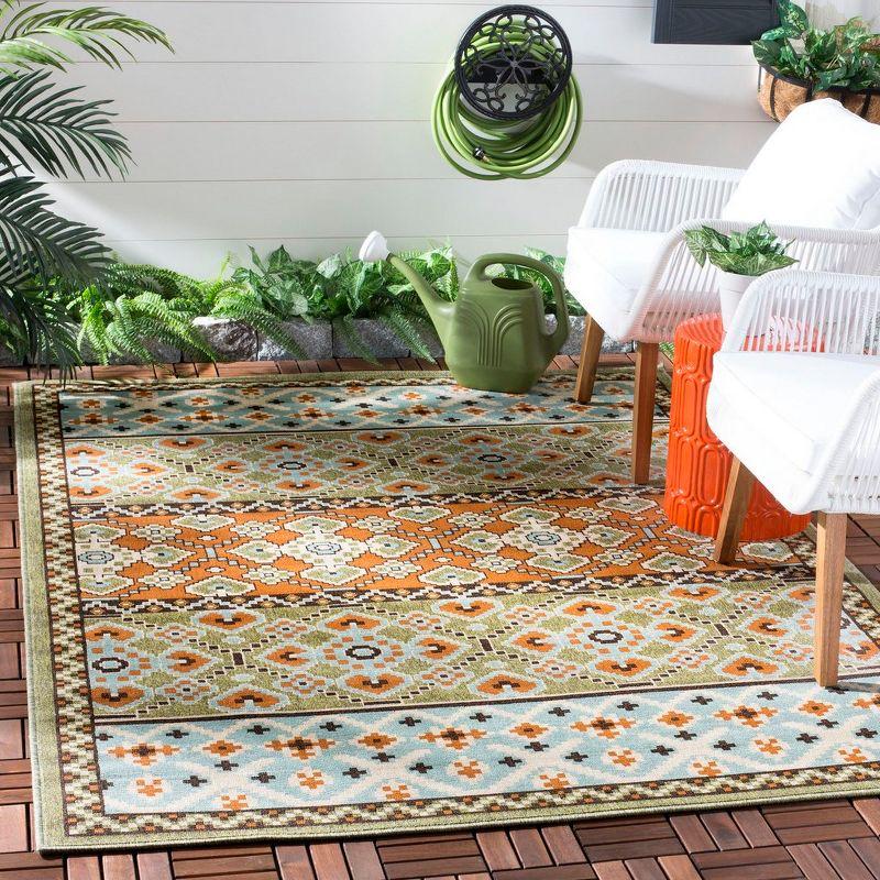 Terracotta & Green Floral Synthetic 8' x 11'2" Easy-Care Outdoor Rug