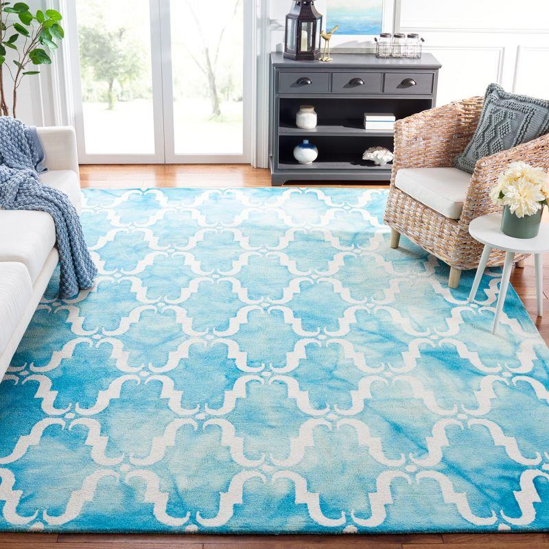 Ivory and Turquoise Hand-Tufted Wool Area Rug 8' x 10'