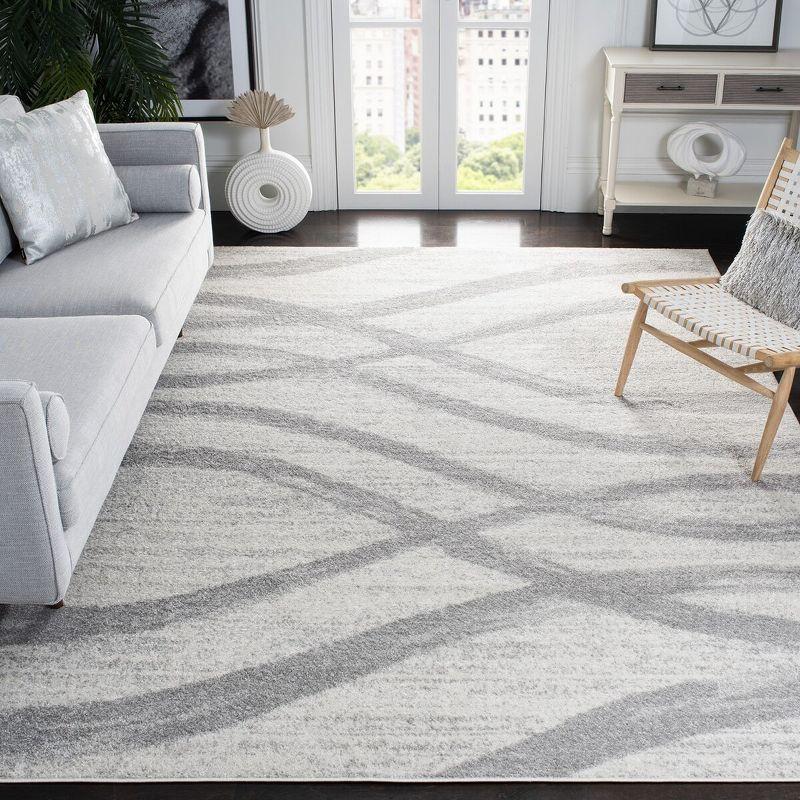 Abstract Cream & Grey Synthetic 9' x 12' Easy-Care Rug