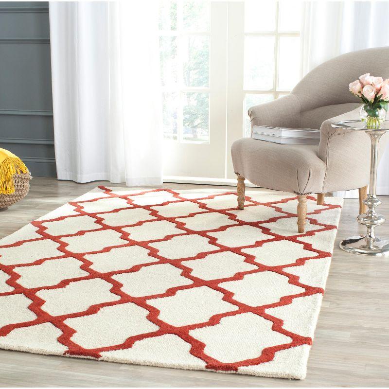 Ivory and Rust Hand-Tufted Wool Round Area Rug - 95"