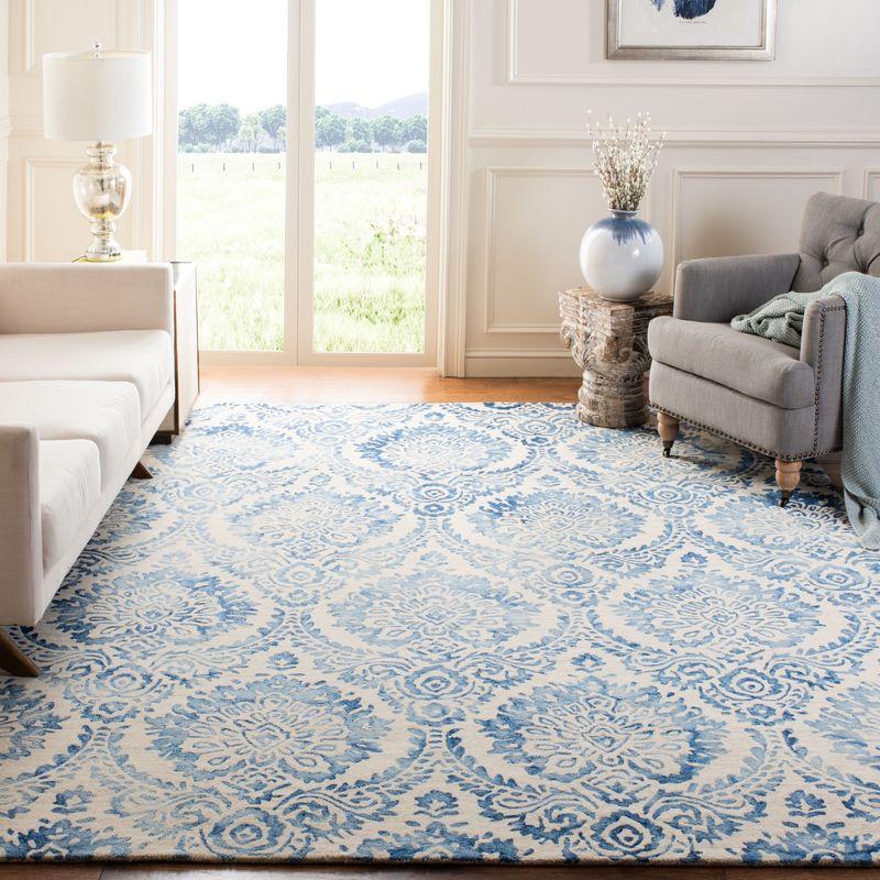 Blue and Ivory Hand-Tufted Wool Area Rug, 5' x 8'