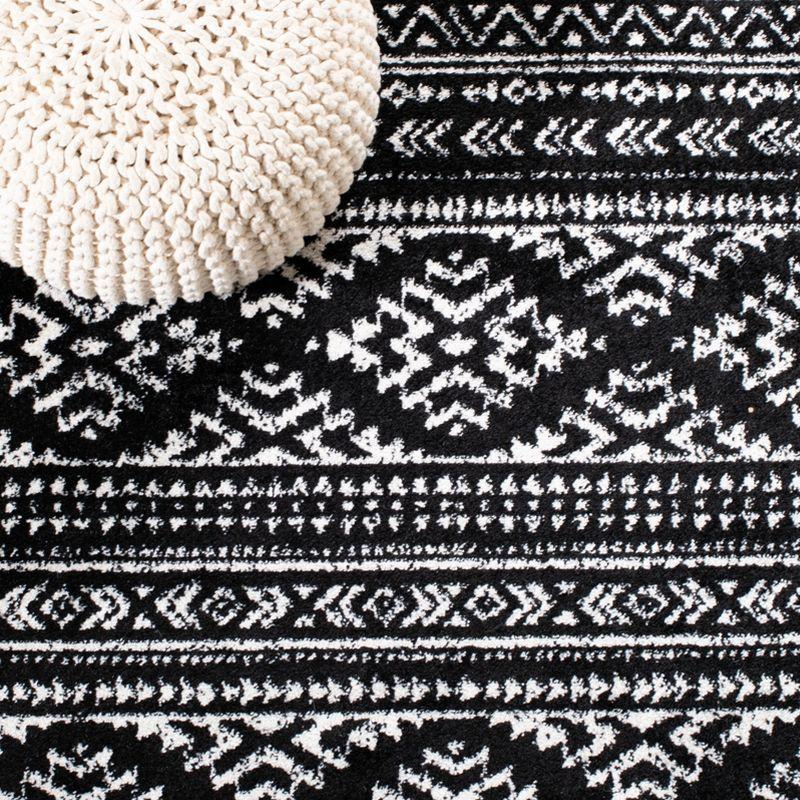 Ivory and Black Geometric Square Synthetic Area Rug