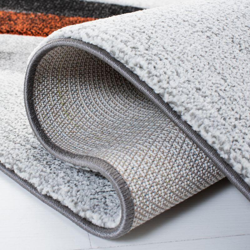 Hollywood HLW710 Machine Made Area Rug - 9'x12' - Grey/Orange - Safavieh