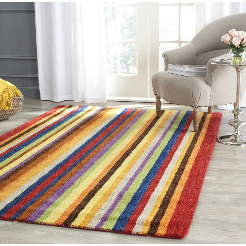 Handmade Red and Multicolor Striped Wool Area Rug 6' x 9'