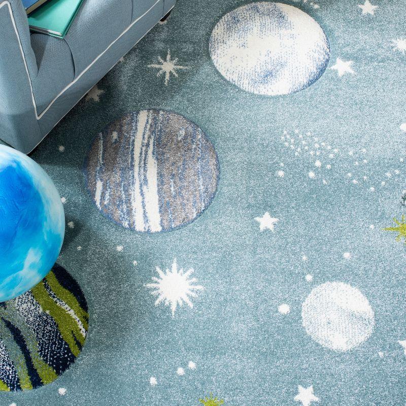 Teal and Ivory Round Kids Planet Rug, 5'3" x 7'6", Synthetic