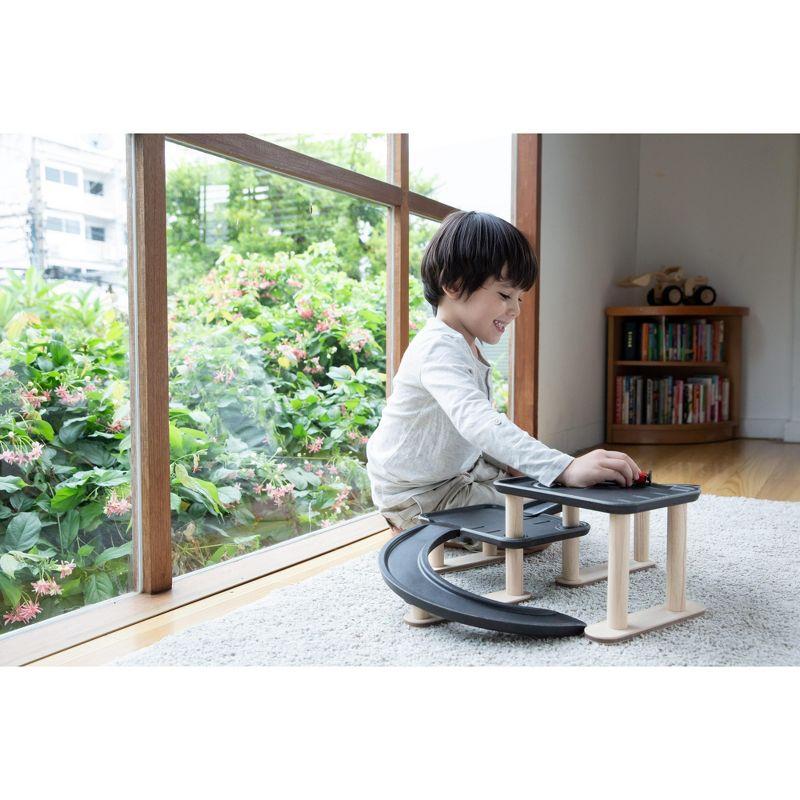 Black and Natural Multi-Level Wooden Parking Garage Playset