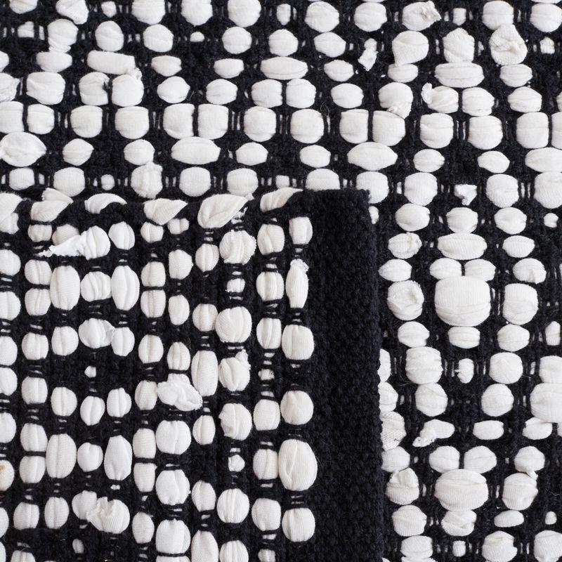 Montauk MTK621 Hand Woven Indoor Accent Rug - Ivory/Black - 4'x6' - Safavieh