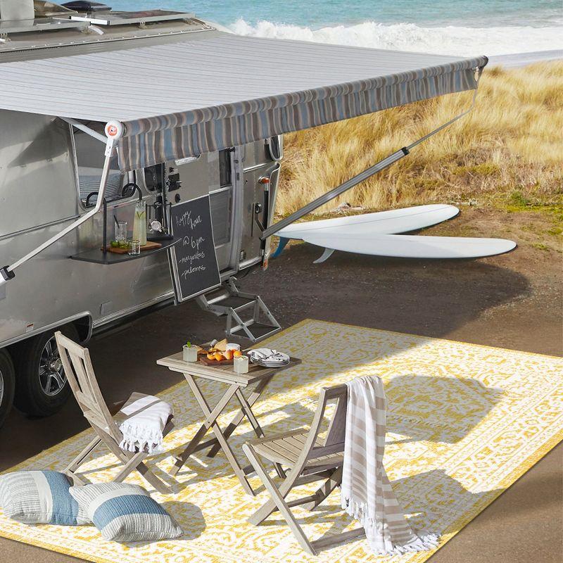9' x 12' Sinjuri Medallion Textured Weave Indoor/Outdoor Area Rug, Yellow/Cream - JONATHAN Y