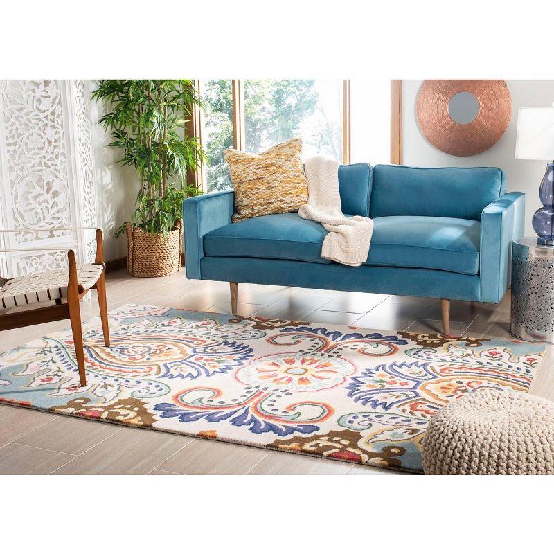 Bella BEL118 Hand Tufted Area Rug - Ivory/Teal - 5'x8' - Safavieh.