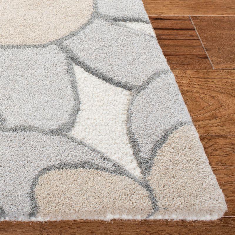 Safavieh Kids SFK923 Hand Tufted Area Rug - Ivory/Pink - 3'x5' - Safavieh.
