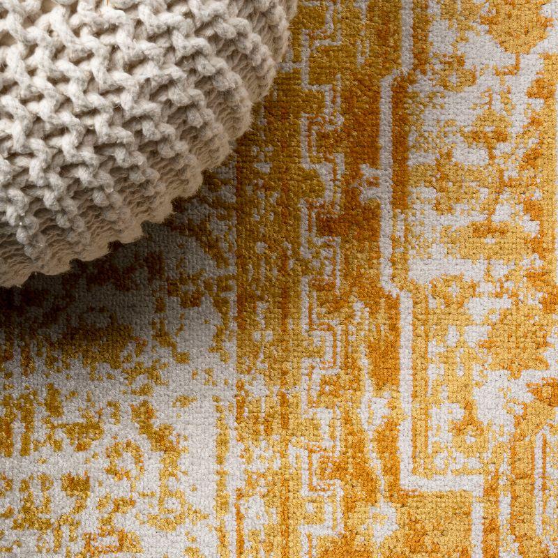 Ivory and Orange Bohemian Medallion 4'x6' Synthetic Area Rug