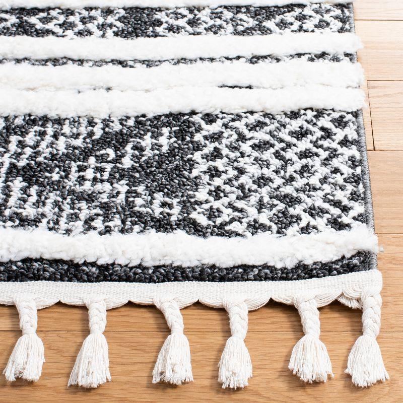 Moroccan Tassel Shag MTS632 Power Loomed Area Rug - Black/Ivory - 3'x5' - Safavieh.