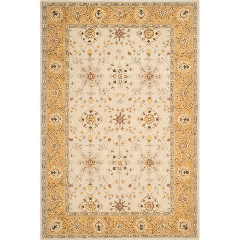 Ivory and Beige Rectangular Synthetic 6' x 9' Area Rug