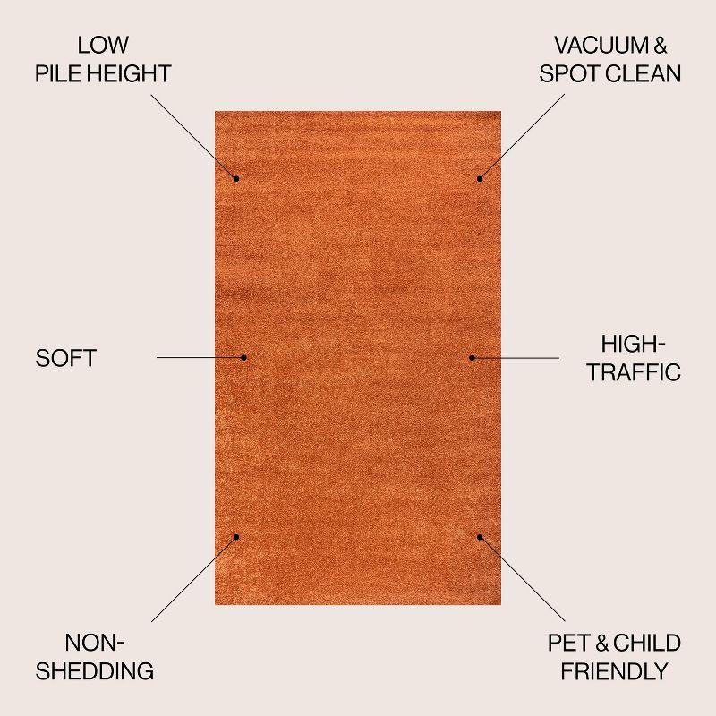 Haze Solid Orange 7' Square Synthetic Area Rug