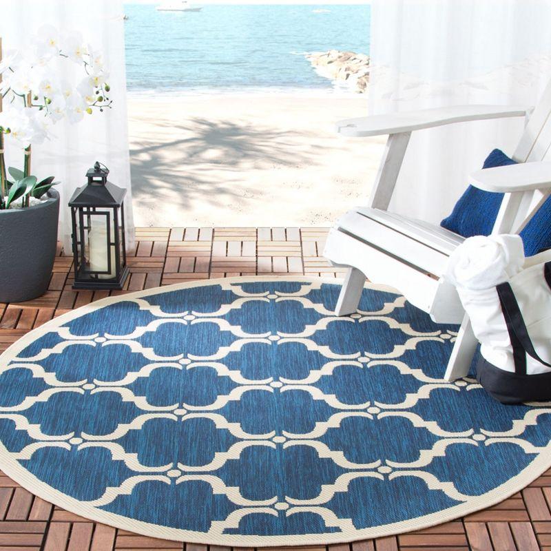 Courtyard Essence Black 59" Round Indoor/Outdoor Synthetic Rug