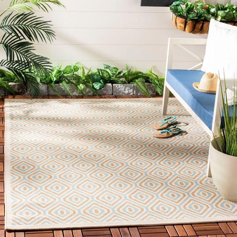 Veranda VER003 Power Loomed Indoor/Outdoor Area Rug - Cream/Aqua - 6'7"x9'6" - Safavieh.