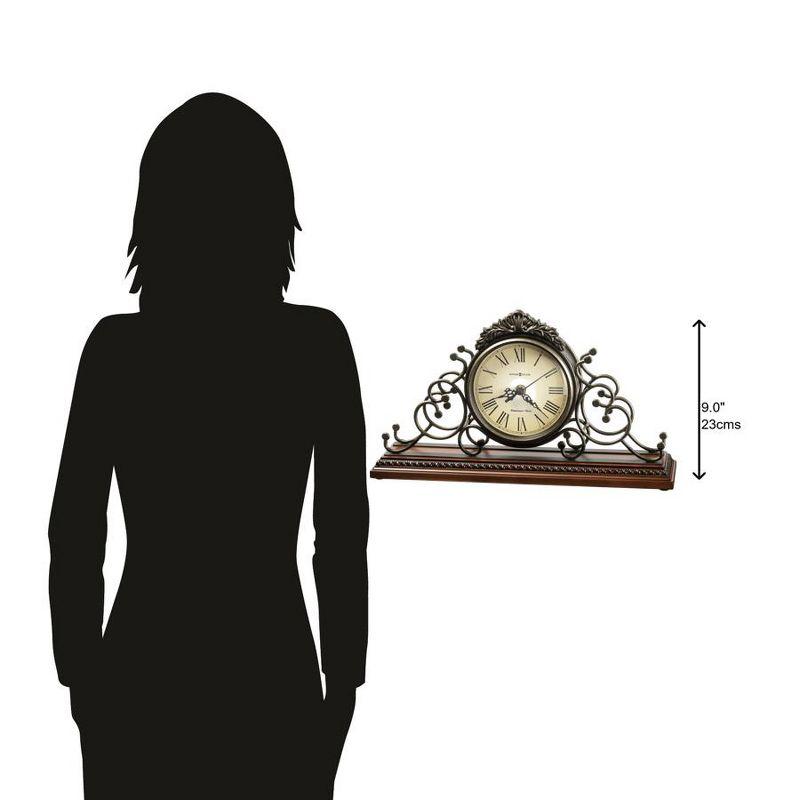 Howard Miller® Adelaide Traditional Roman Numeral Metal Quartz Movement / Crystal Tabletop Clock in Antique Warm-Gray/Windsor Cherry