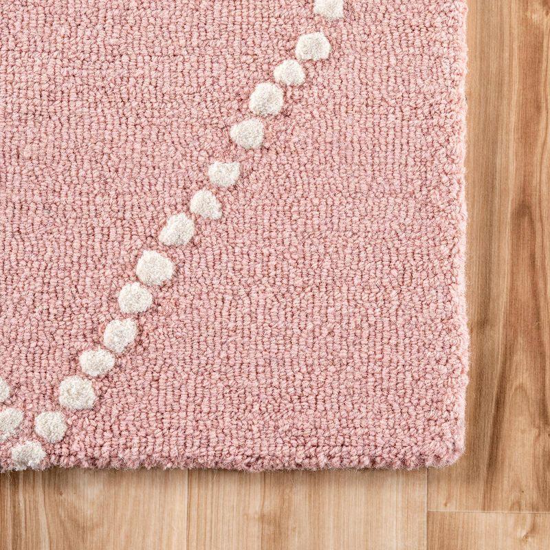 Charming Baby Pink Handmade Wool Rug 4' x 6' with Tufted Detail