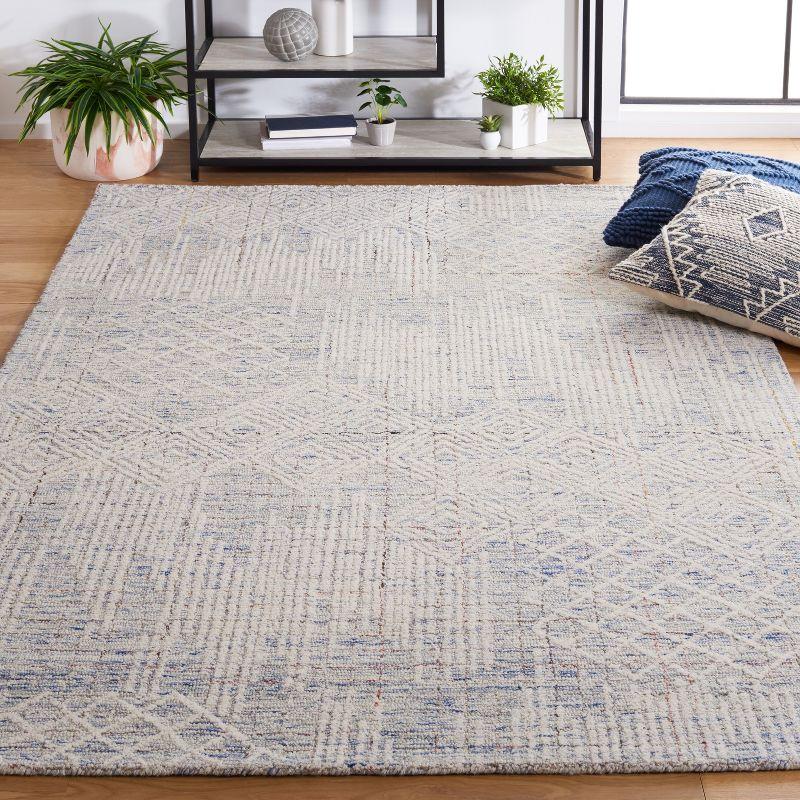 Blue and Ivory 4' x 6' Hand-Tufted Wool Area Rug