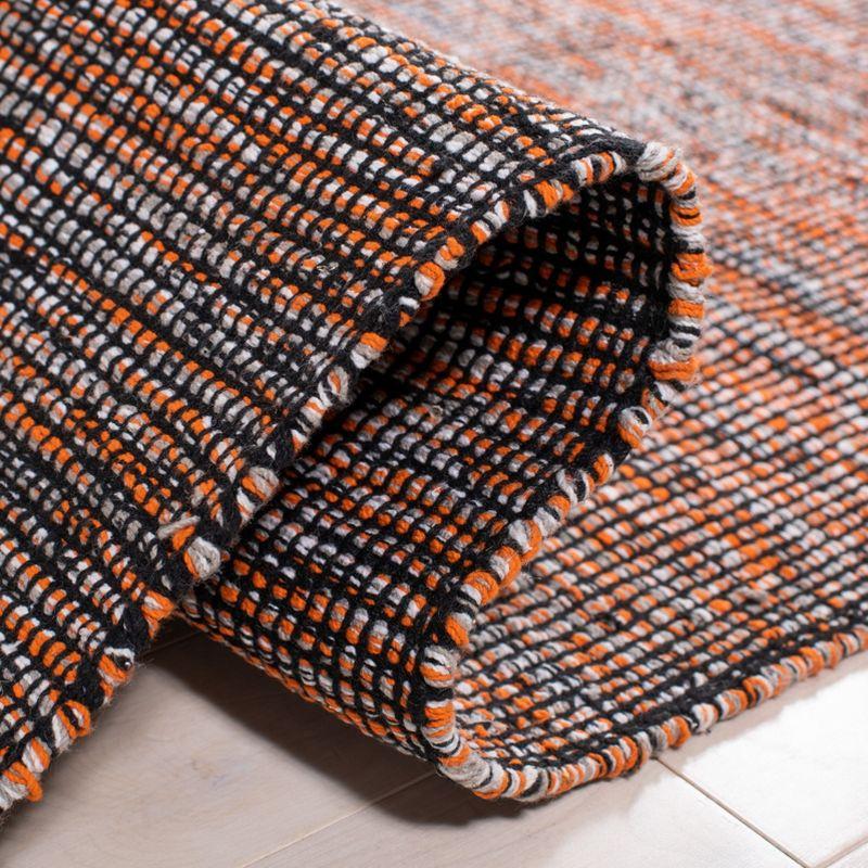 Montauk MTK620 Hand Woven Area Rug - Orange/Black - 6'x9' - Safavieh.