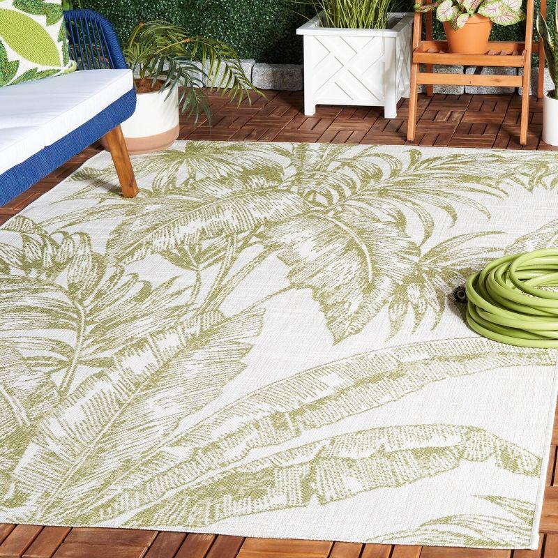 Ivory and Green Botanical Synthetic Area Rug