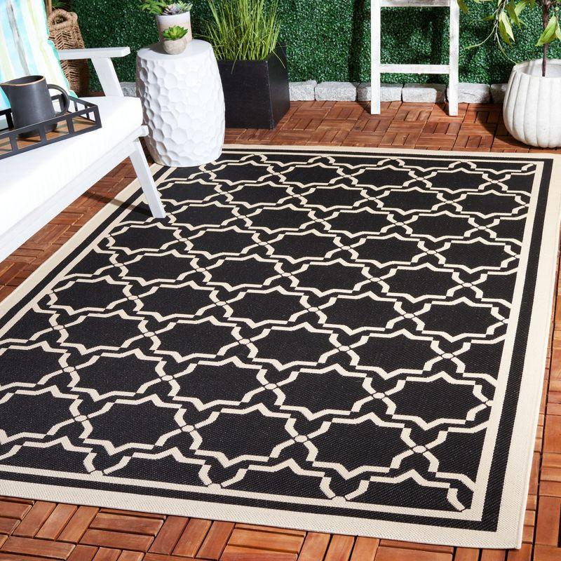 Elegant Black Synthetic 59" Rectangular Indoor/Outdoor Rug