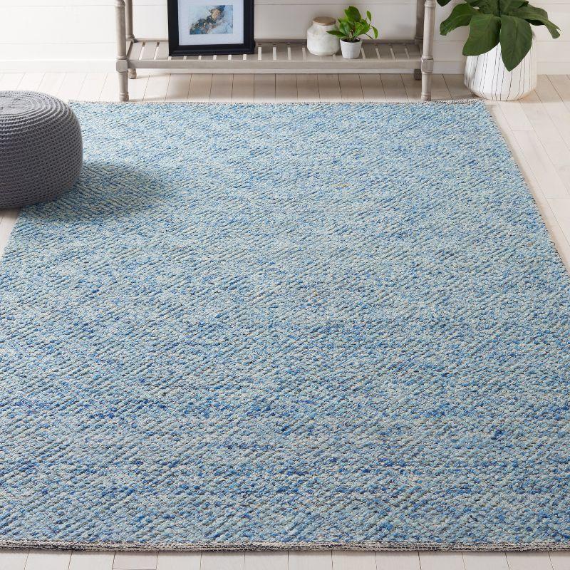 Hand-Tufted Coastal Charm Blue Wool 4' x 6' Braided Area Rug