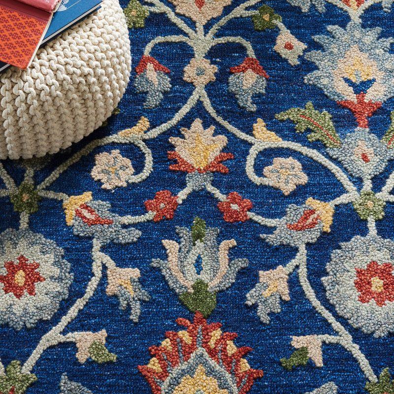 Blossom BLM562 Hand Tufted Area Rug - Blue/Rust - 5'x8' - Safavieh.