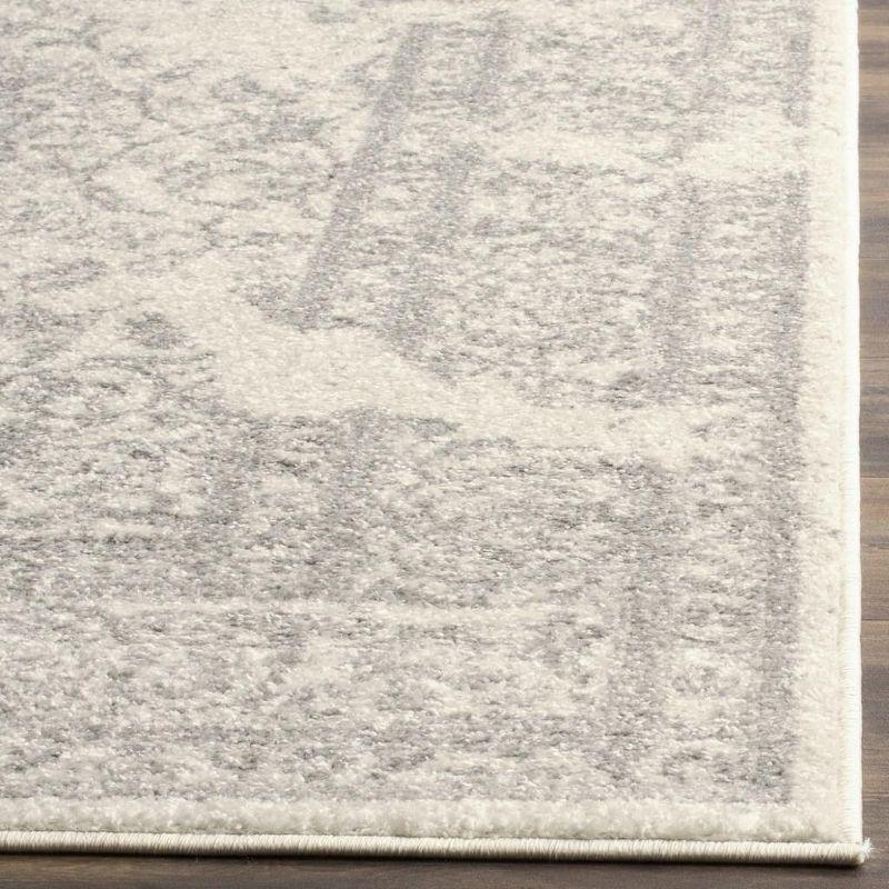 Ivory and Silver Synthetic 8' x 10' Easy-Care Rectangular Rug