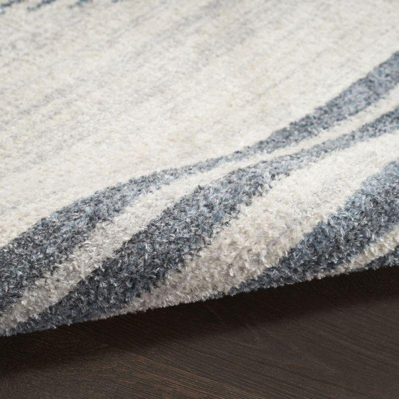 Nourison Astra Machine Washable Stripe Circle Mid-Century Modern Indoor Rug Ivory Blue 5'3" x 7'