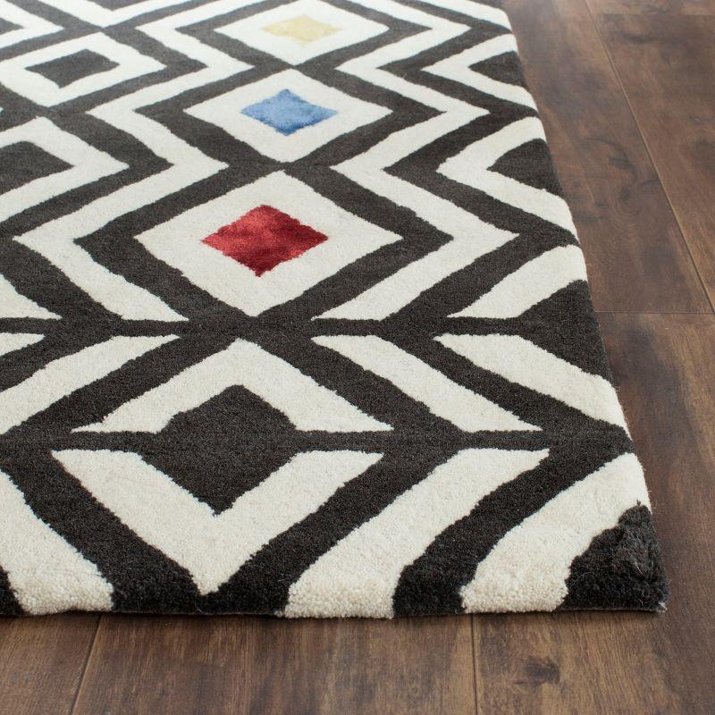 Soho SOH341 Hand Tufted Area Rug  - Safavieh