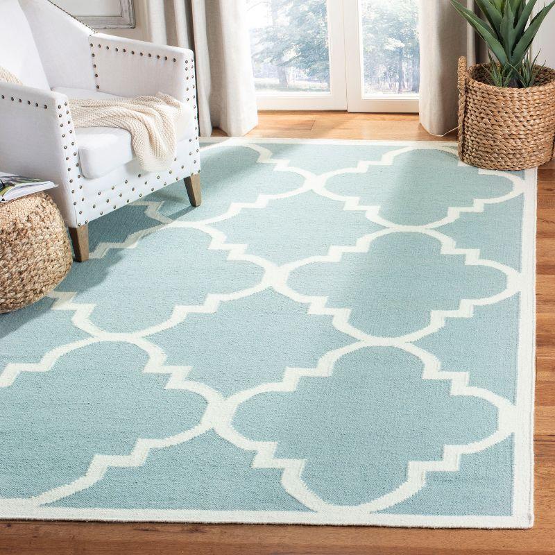 Ivory and Light Blue Geometric Wool Area Rug, 6' x 9'