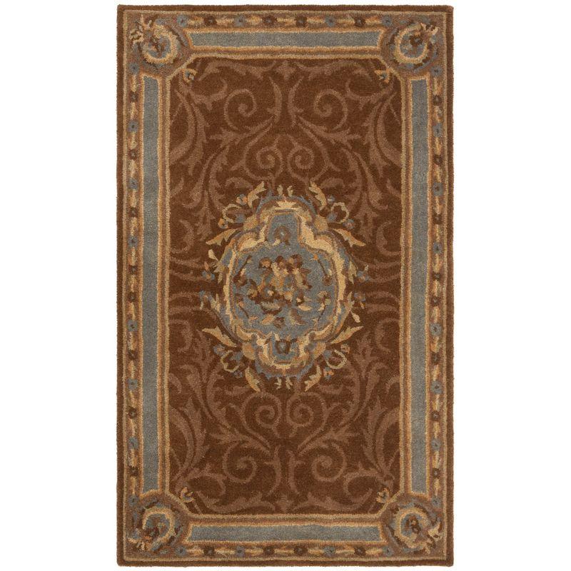Empire EM409 Hand Tufted Wool Accent Rug - Blue/Brown- 2' X 3' - Safavieh.