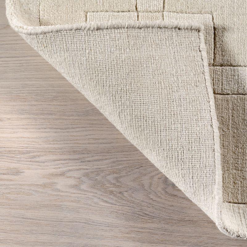 Latitude Run® Rune Bordered Wool-Blend Area Rug