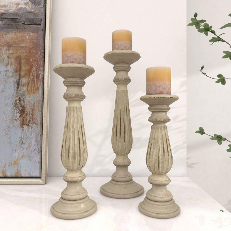 Olivia & May Set of 3 Farmhouse Mango Wood Teardrop Designed Pillar Candle Holders: Rustic Wooden Candlestick Holders