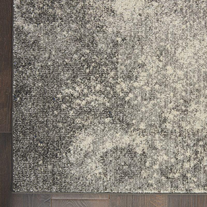 Charcoal Ivory Abstract Synthetic 45x69 Medium Area Rug