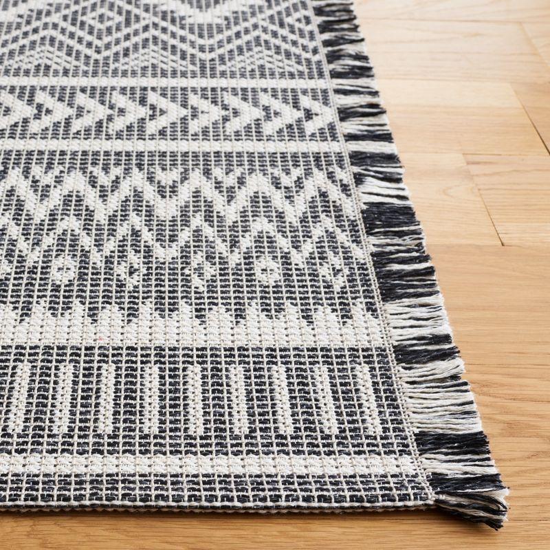 Augustine Black and White 4' x 6' Flat Woven Synthetic Rug