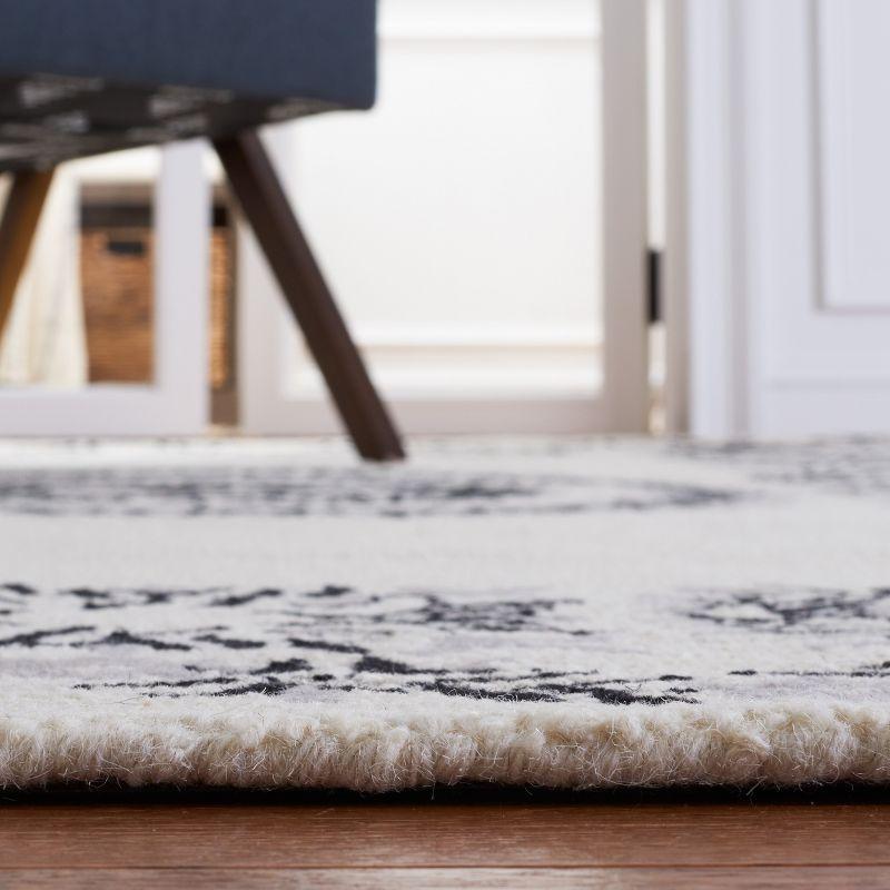 Empire EM826 Hand Tufted Area Rug - Ivory/Black - 3'x5' - Safavieh.