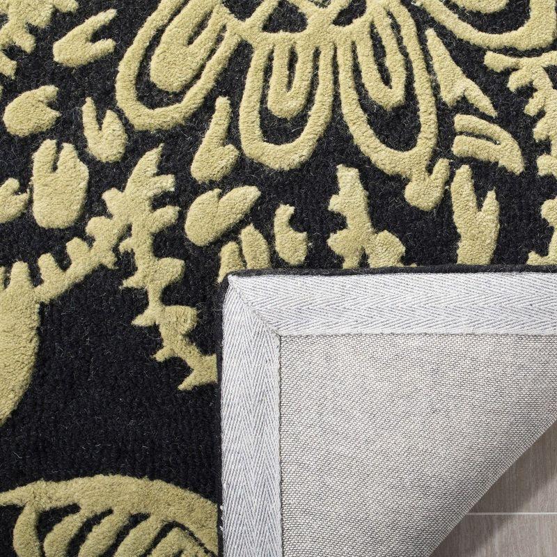 Handmade Black and Yellow Tufted Wool Area Rug