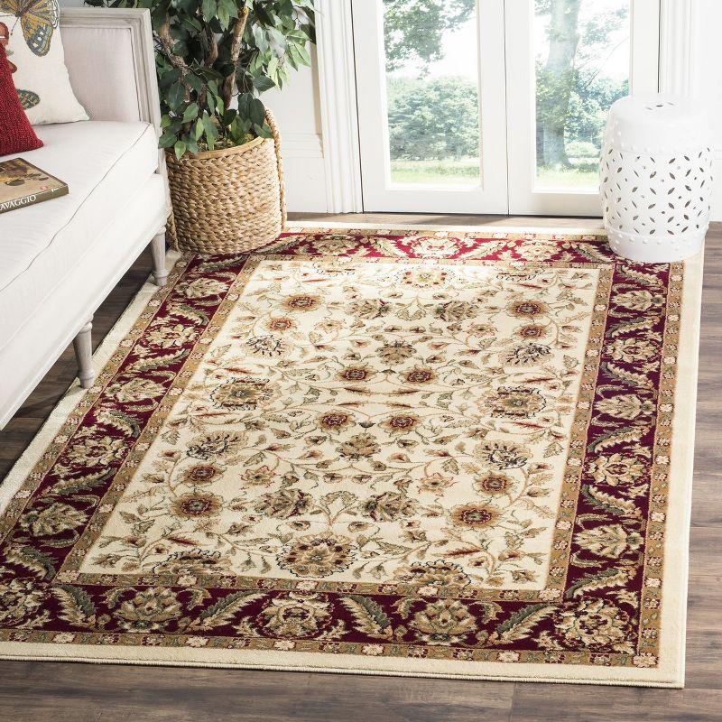 Ivory and Red Floral Synthetic 6' x 9' Area Rug