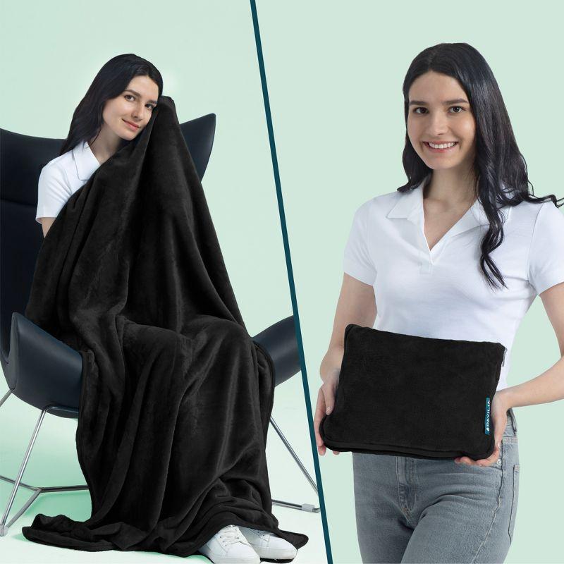 PAVILIA Travel Blanket and Pillow, Warm Soft Fleece 2-IN-1 Combo Large Compact Set for Airplane Camping Car Trips (Black, 60 x 43 inches)