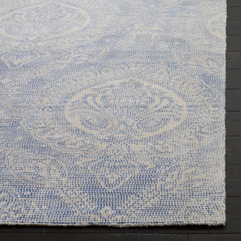 Marbella Blue and Ivory Hand Loomed Wool Area Rug