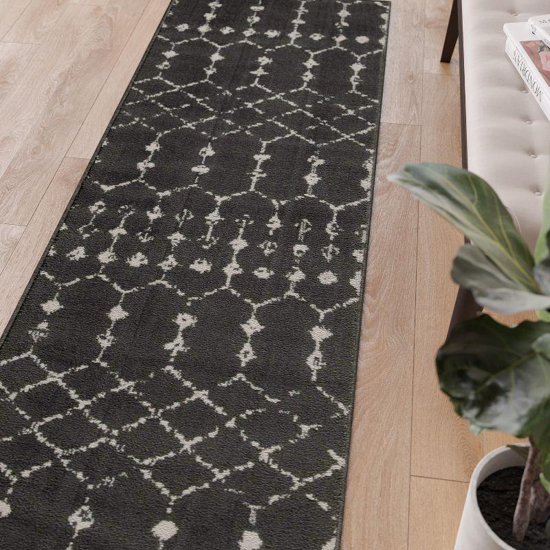 Dark Gray and Ivory Geometric Bohemian Low Pile Rug, 2' x 6'