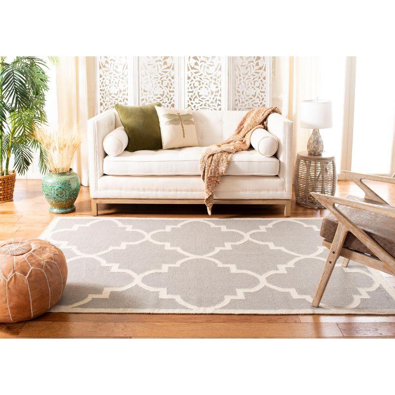 Dhurries DHU633 Hand Woven Area Rug - Dark Grey/Ivory - 5'x8' - Safavieh.