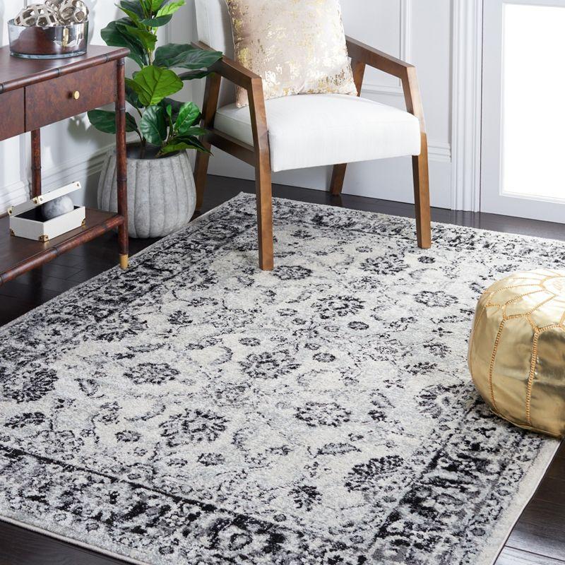 Ivory and Black Rectangular Synthetic Area Rug