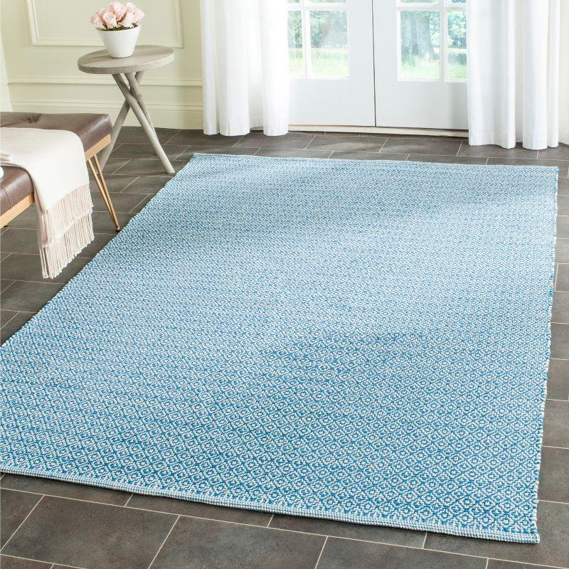 Montauk MTK717 Hand Woven Area Rug - Ivory/Blue - 5'x7' - Safavieh.