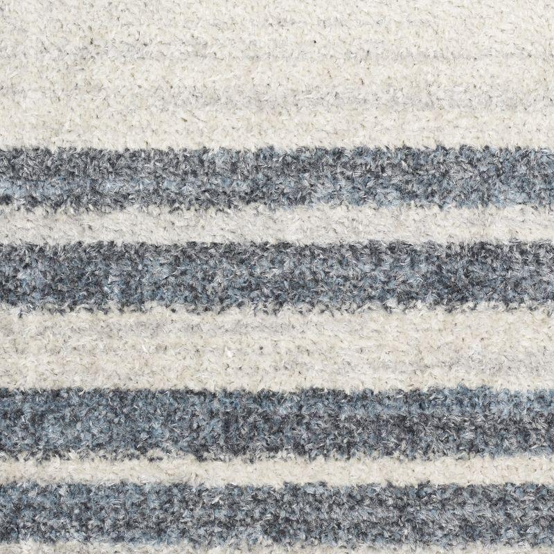 Nourison Astra Machine Washable Stripe Circle Mid-Century Modern Indoor Rug Ivory Blue 5'3" x 7'