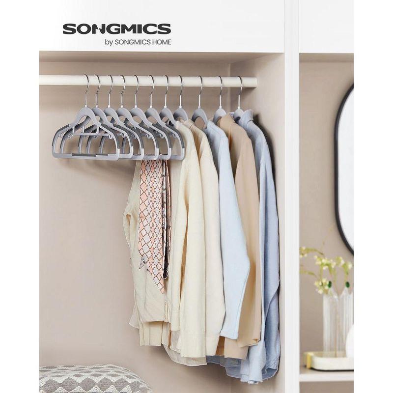 SONGMICS Coat Hangers Non-Slip Clothes Hangers Space-Saving Plastic Hangers 360°Swivel Rose Gold Hook