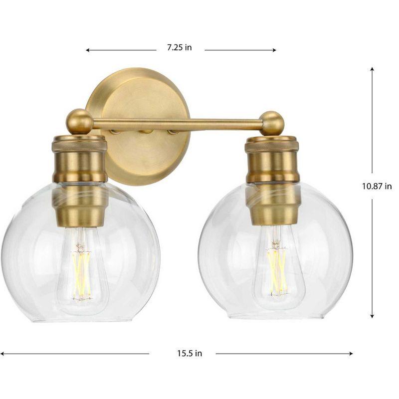 Progress Lighting Hansford 2-Light Bath Light Vintage Brass with Clear Globe Glass Shade